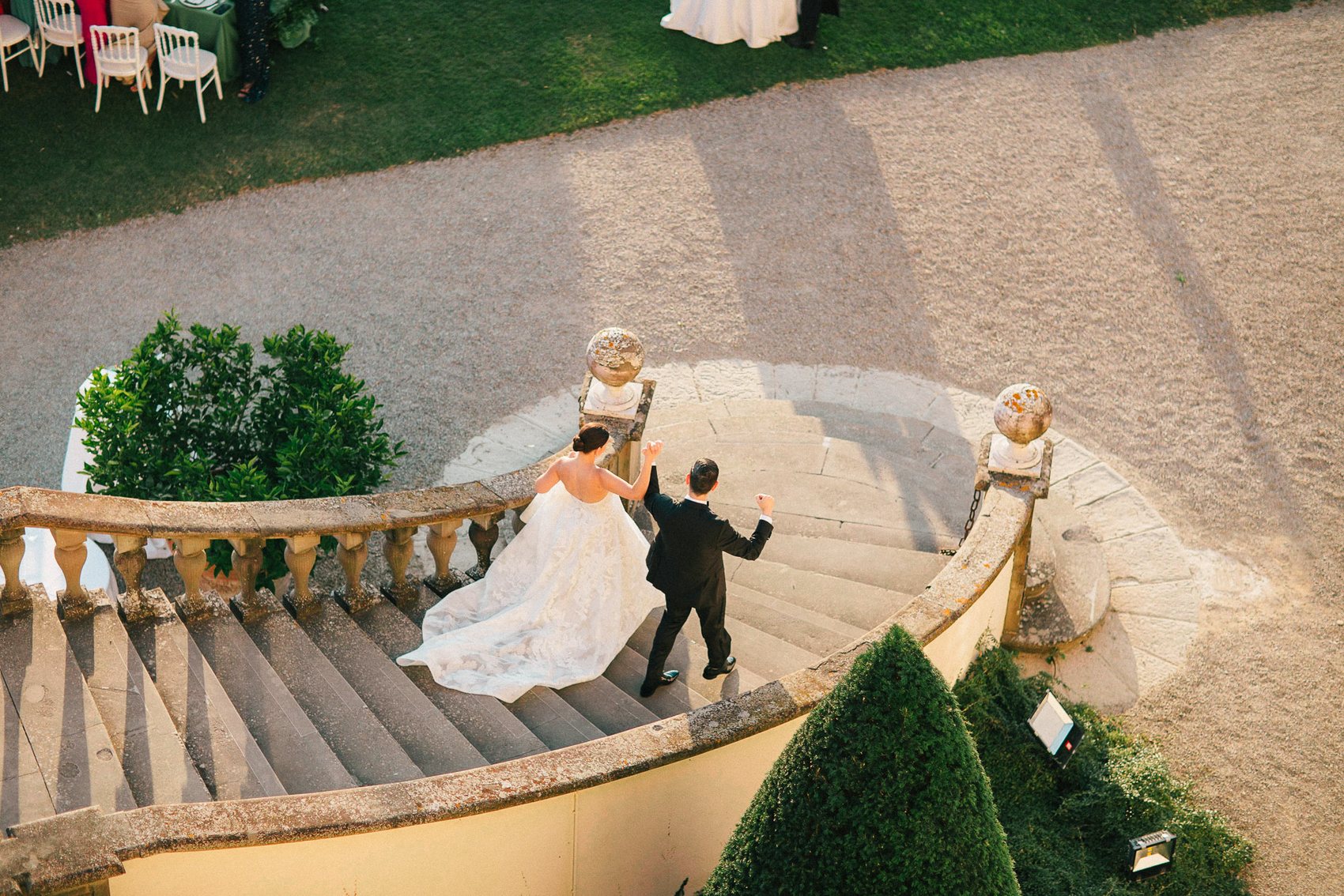 Bride preparing beside an Italian villa window